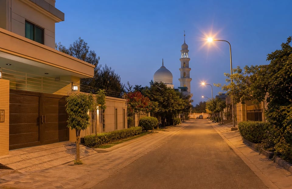Well-lit residential street near a mosque in Sargodha